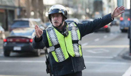 image of officer doing traffic direction