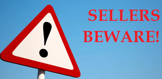 seller beware sign