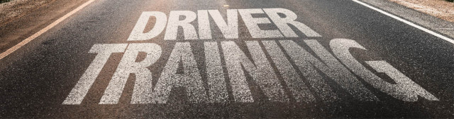image of the words driver training painted on the highway