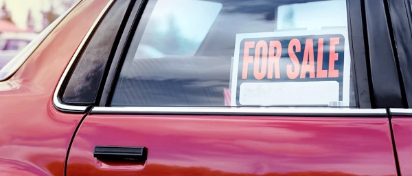 image typical of for sale signs in car windows