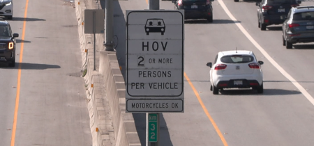 image of an hov lane sign on a highway in BC