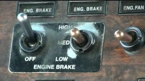image of jake brake control switch on truck dash