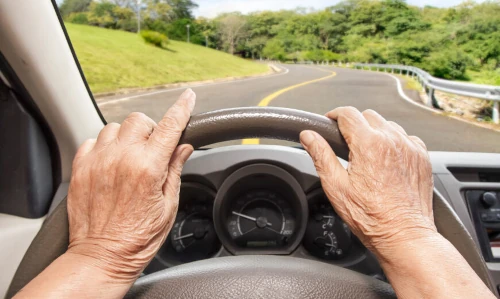 image typical of seniors behind the wheel