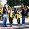 Pedestrians Hold Hands