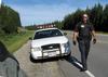 Police Officer on foot approaching driver