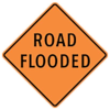 Image of a road flooded traffic sign